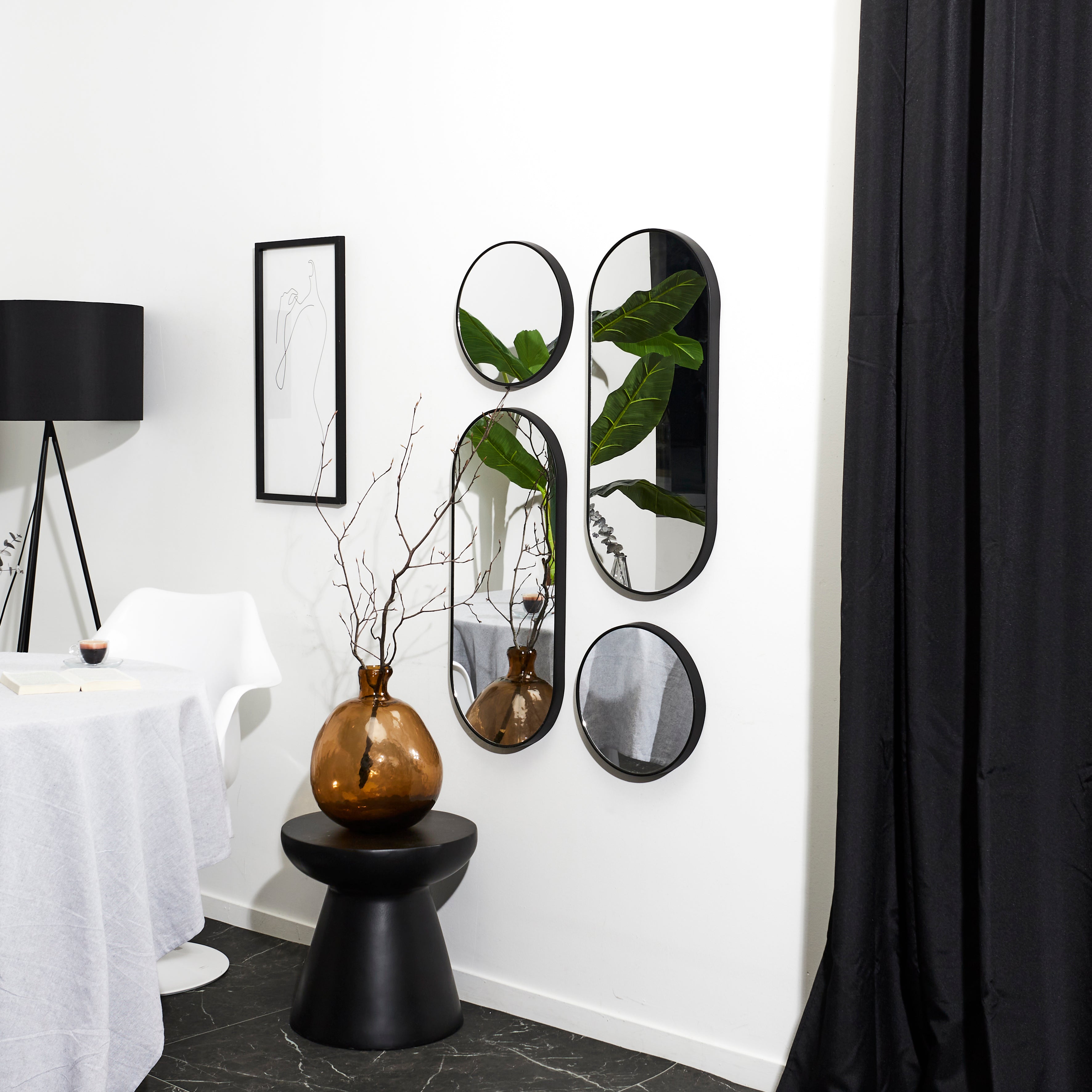 MIROIR DECO ROND ET OVALE VERSA NOIR X4