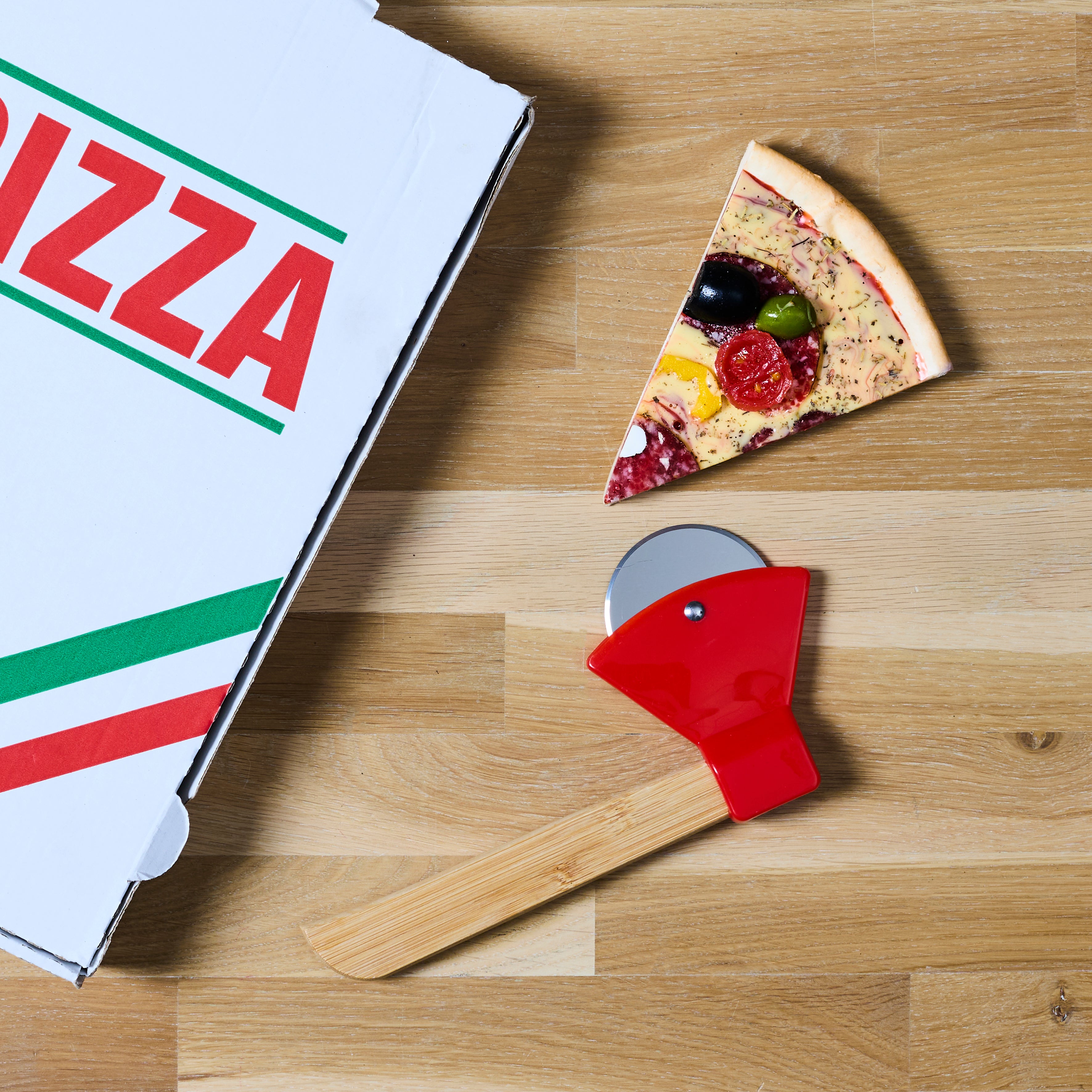 ROULETTE A PIZZA EN FORME DE HACHE