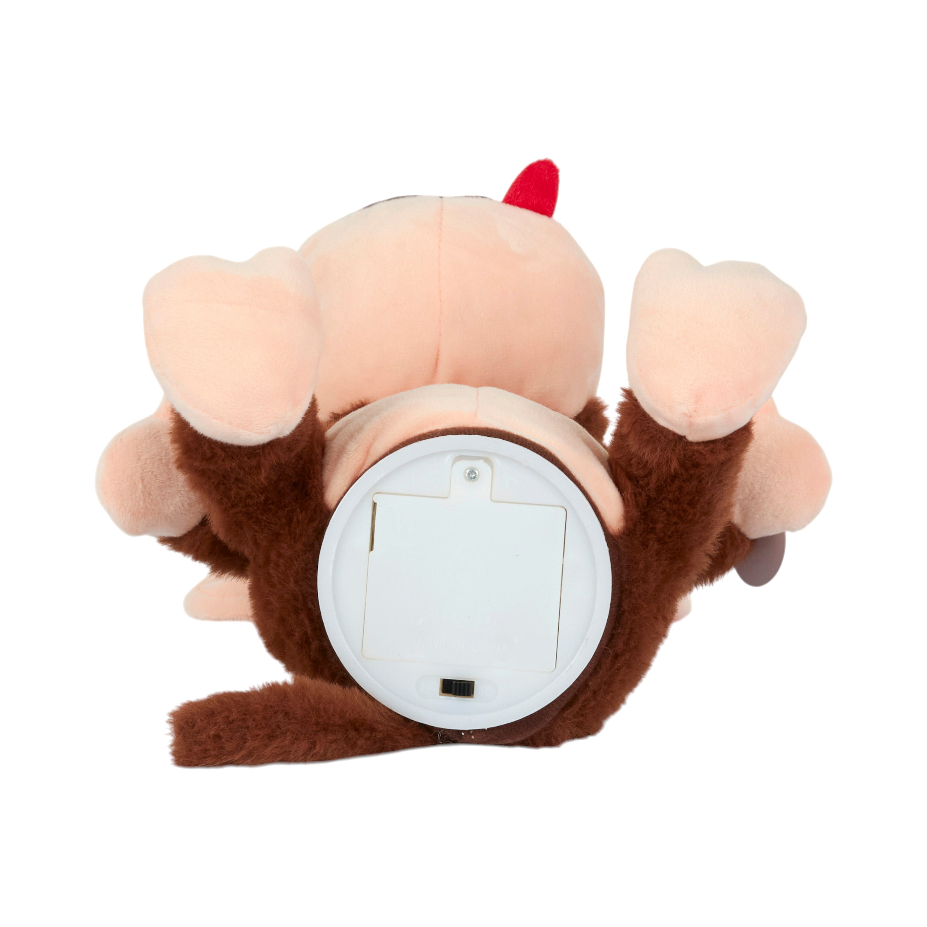 PELUCHE SINGE FOU A PILES